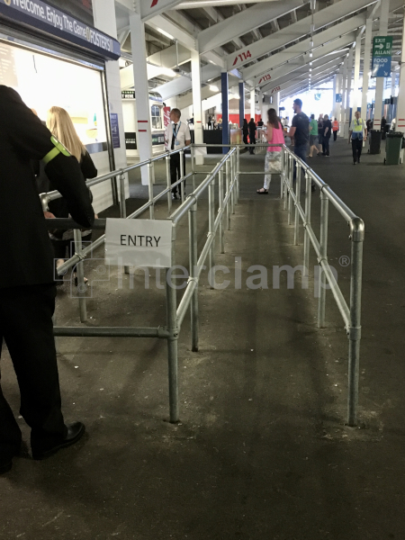 Stadium queue management barrier built using Interclamp handrail components and galvanized steel tube.